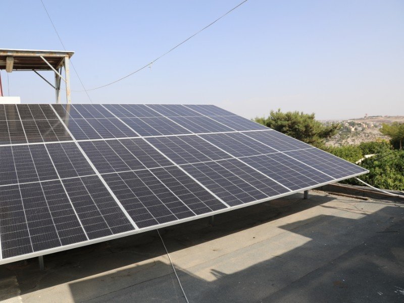 A 10 kW Solar Panel system is installed over the rooftop.